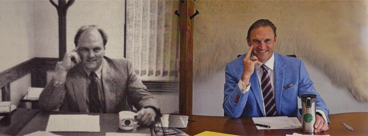 Jim Yuel in 1986 and Greg Yuel at the 40th anniversary in matching desk poses